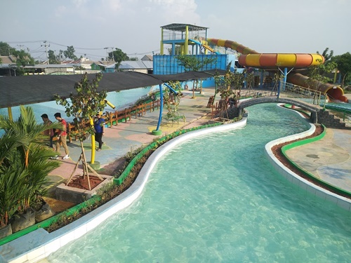 kolam renang taman ombak karawang